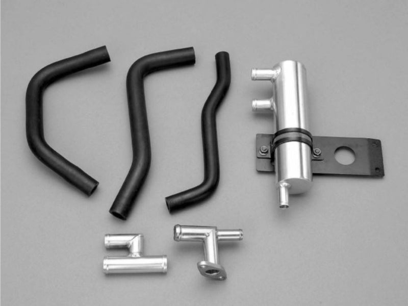Load image into Gallery viewer, Nismo RB26 oil separator kit for R32/R33/R34 GTR. Includes silver aluminum components and black rubber hoses.