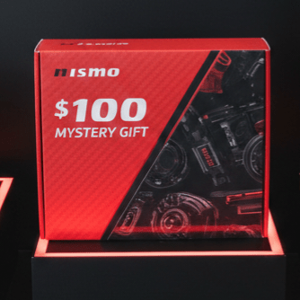Load image into Gallery viewer, Nismo Heritage $100 Mystery Gift box featuring graphics of classic Skyline (R32/R33/R34) engine parts in red and black.