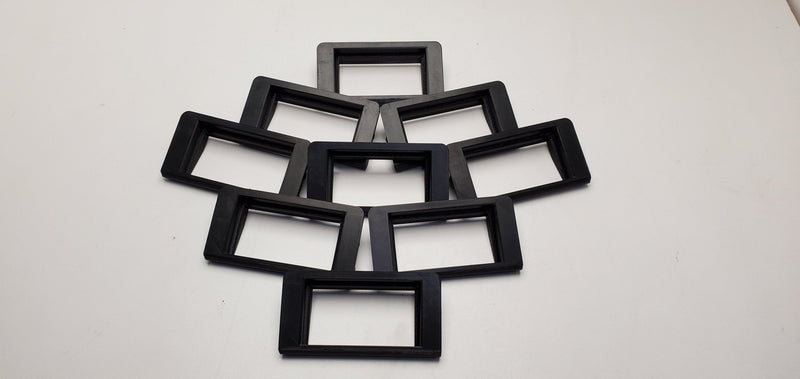 Load image into Gallery viewer, Seven black HKS EVC boost controller mounts for Nissan R32, arranged in a cluster on a white surface.