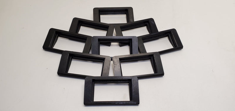 Load image into Gallery viewer, Multiple black 3D-printed HKS EVC boost controller mounts for Nissan R32, arranged in a fan pattern on white.