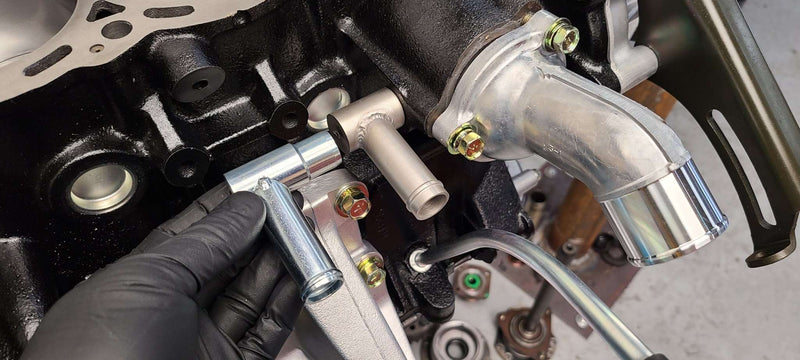 Load image into Gallery viewer, U.P.G. RB26 bypass hose connector OEM 14075-62S01 replacement