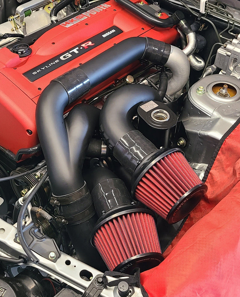Load image into Gallery viewer, U.P.G. matte black piping kit with dual red cone air filters for Nissan Skyline R33/R34 GT-R engine bay.