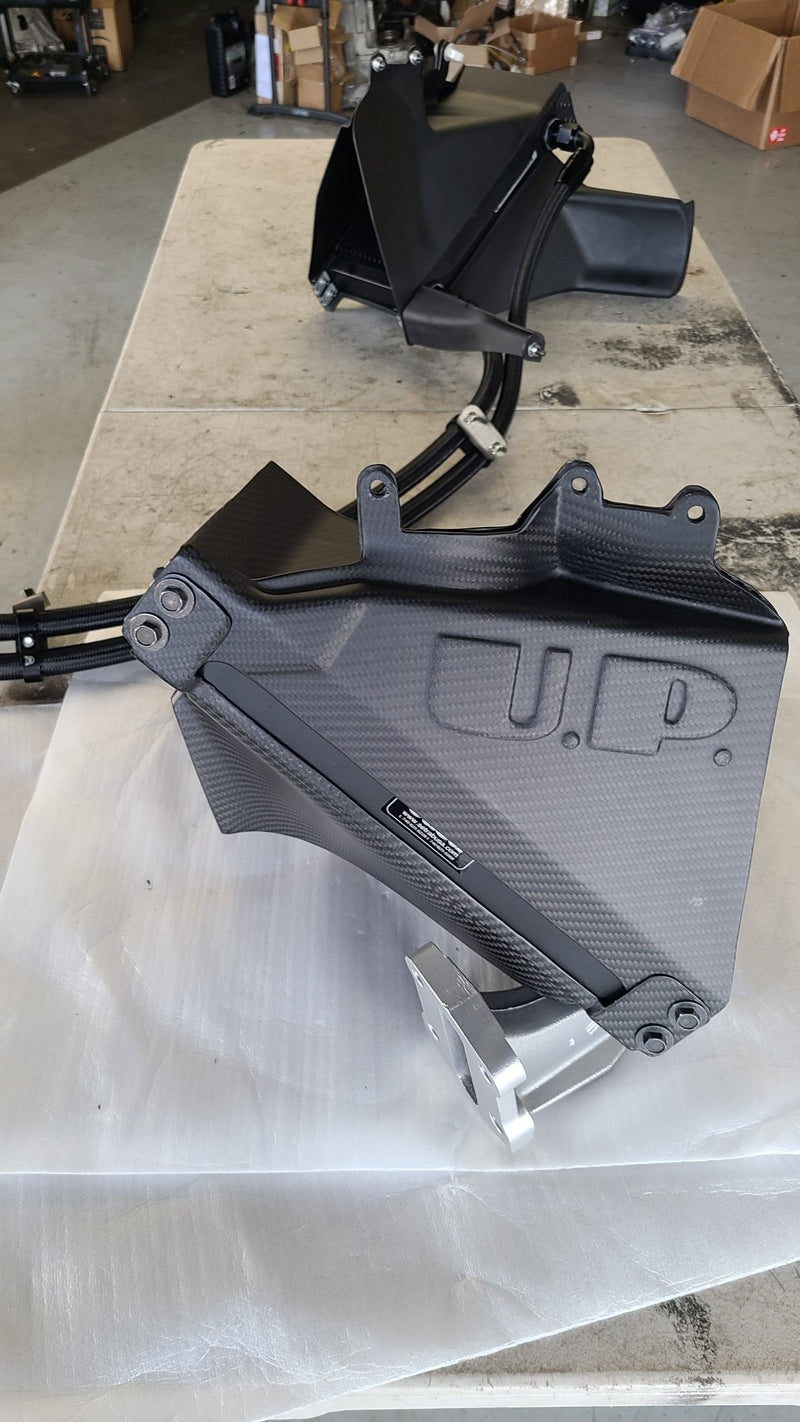 Load image into Gallery viewer, U.P.G. oil cooler and carbon fiber duct combo for Nissan R32 GTR on a white surface.