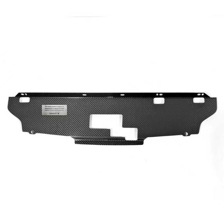 Load image into Gallery viewer, Dry carbon cooling panel for Nissan Skyline GT-R with metallic branding badge, shown in black carbon fiber weave.