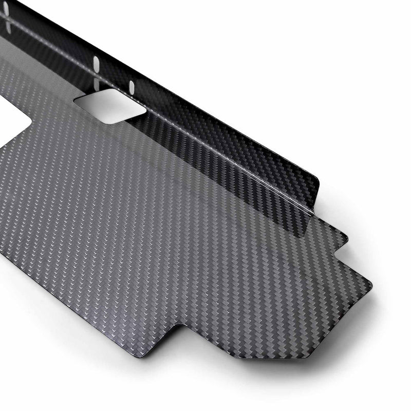 Load image into Gallery viewer, Black dry carbon cooling panel for Nissan Skyline GT-R, showing intricate weave pattern and mounting cutouts.