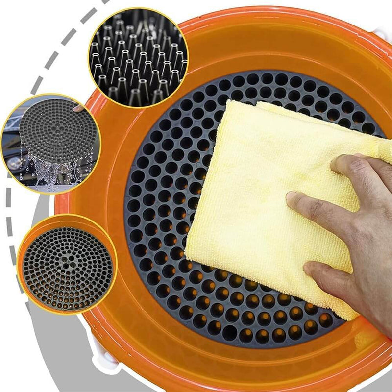 ギャラリービューアに画像をロードする, WASH&WHIPS black plastic bucket grit guard for car detailing, shown inside an orange bucket with a yellow cloth.