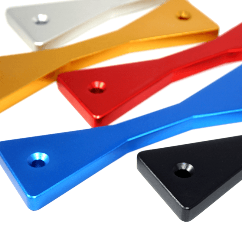 ギャラリービューアに画像をロードする, ZSPEC billet battery hold-down brackets for Nissan GTR R35 in assorted metallic colors.
