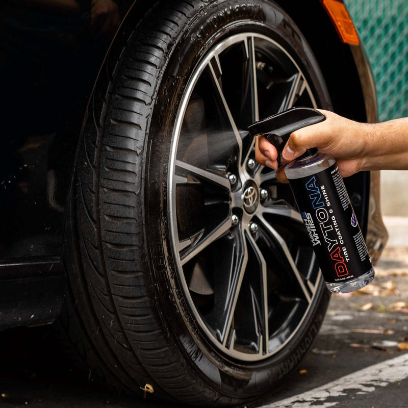 ギャラリービューアに画像をロードする, Spraying Wash & Whips Daytona tire shine on a black Toyota Camry alloy wheel.