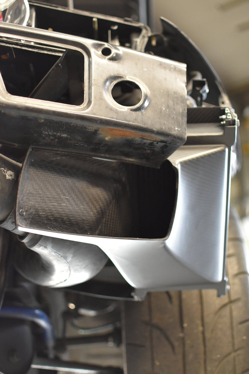 Load image into Gallery viewer, Complete R32 GTR oil cooler kit with carbon fiber ducting installed behind the front bumper support.