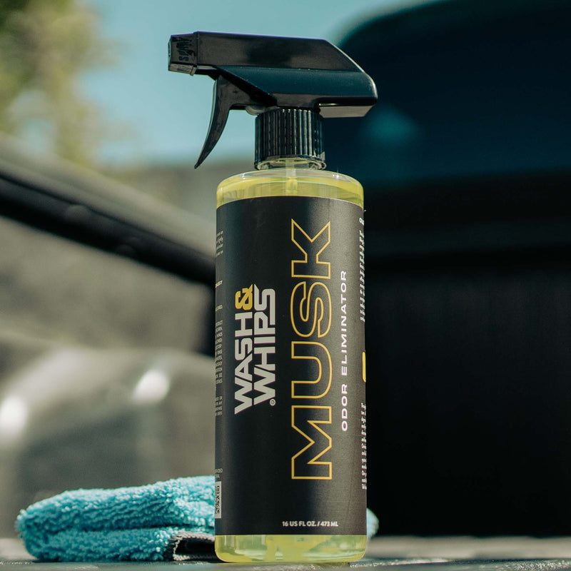 ギャラリービューアに画像をロードする, 16oz yellow Wash & Whips Musk odor eliminator spray bottle with a blue microfiber towel.