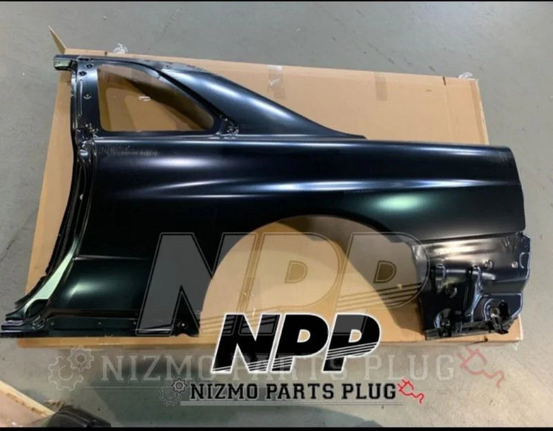 Load image into Gallery viewer, Black Nissan car quarter panel replacement part on cardboard, Nismo Parts Plug branding