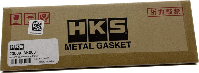 Load image into Gallery viewer, HKS Exhaust Manifold Gaskets packaging showing part number 23009-AK003, designed for RB26DETT applications.