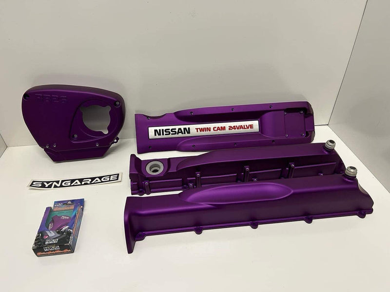 Load image into Gallery viewer, HKS Purple RB26 Valve Cover Set *Core Charge* including front timing cover and side covers.