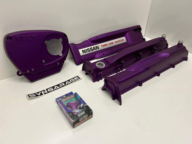 Load image into Gallery viewer, HKS Purple RB26 Valve Cover Set *Core Charge* with timing cover and valve covers for Nissan.