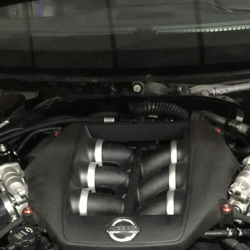 Cargue la imagen en el visor de la galería, ZSPEC fastener kit installed on a Nissan GTR R35 engine bay featuring red billet washers and stainless bolts.