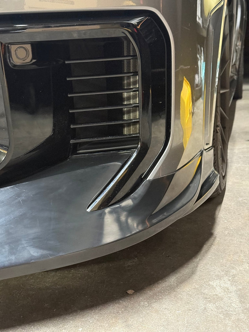 Load image into Gallery viewer, Glossy black front lip installed on 2025+ Toyota GR Corolla (E210/Kouki) bumper.