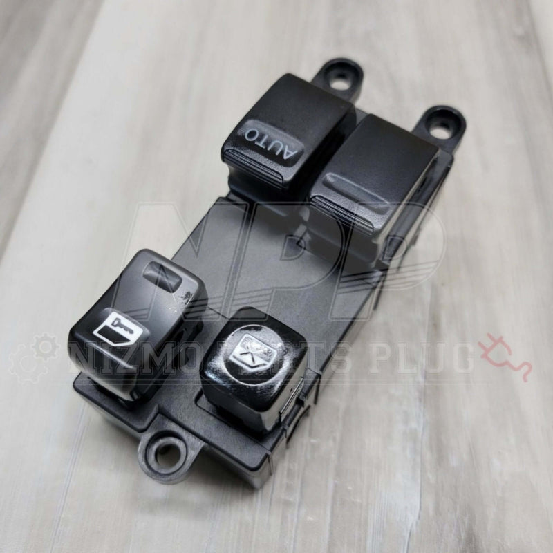 Load image into Gallery viewer, Nissan R34 Skyline Master Power Window Switch Assembly (Late Model) - NizmoPartsPlug