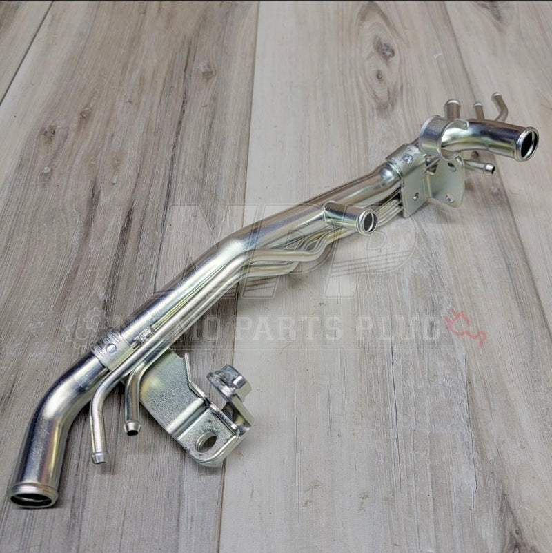 Load image into Gallery viewer, Silver Nissan R32 Skyline GTR RB26DETT front water heater and vacuum pipe assembly in clean, excellent condition.