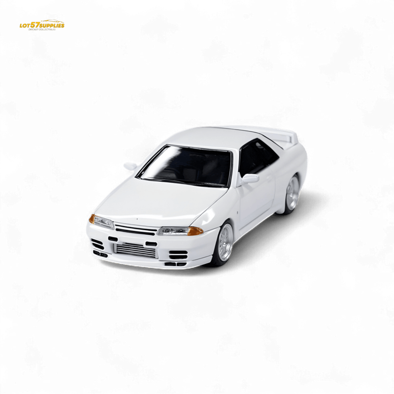 Load image into Gallery viewer, 1:64 scale diecast white Nissan Skyline GT-R R32 Nismo S-Tune model car isolated on black.