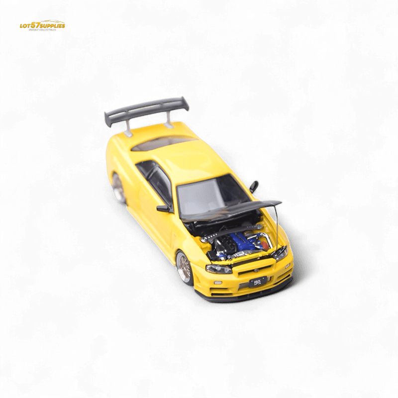 Load image into Gallery viewer, 1:64 scale yellow Nissan Skyline R34 Z-Tune diecast model car with carbon hood and open engine bay.