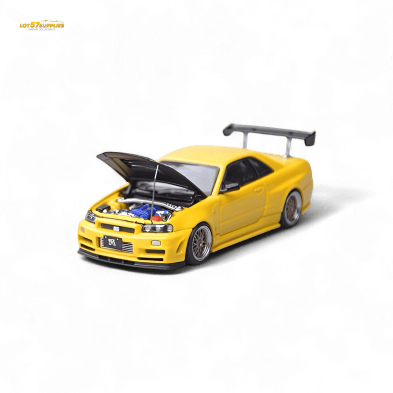 Load image into Gallery viewer, Yellow 1:64 scale Focal Horizon Nissan Skyline GT-R R34 Z-Tune diecast model car with open carbon hood.