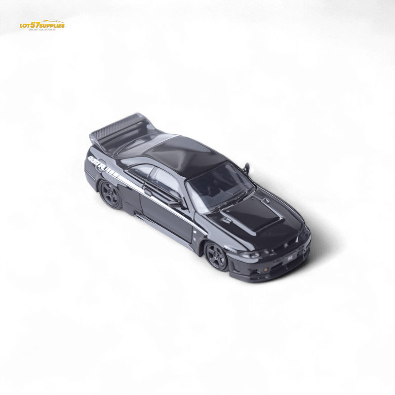 Load image into Gallery viewer, 1:64 scale black Nissan Skyline GT-R R33 Nismo 400R diecast model car with white side decals on a black background.