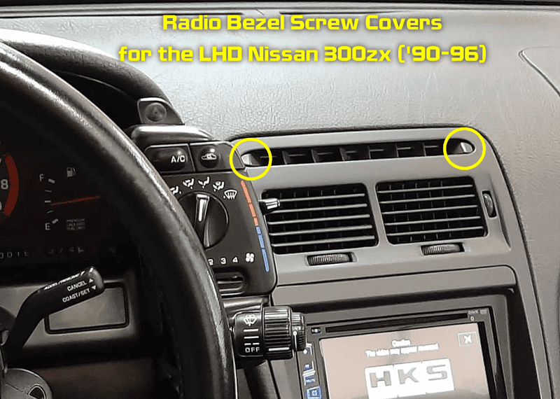 Load image into Gallery viewer, Black ZSPEC radio bezel top screw covers installed in a 1990-1996 Nissan 300ZX LHD interior.