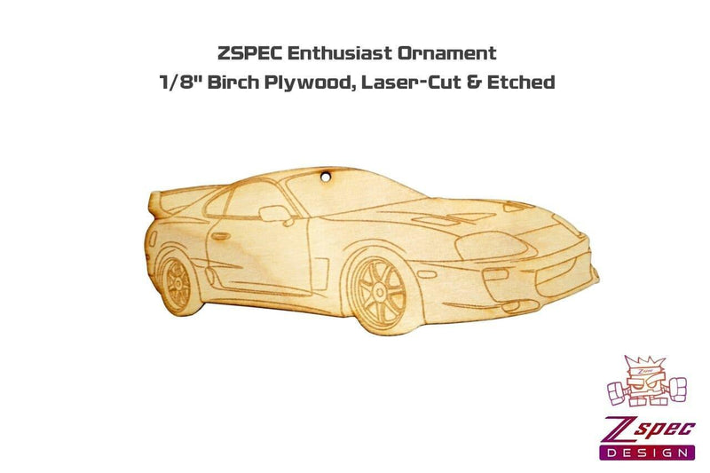 Load image into Gallery viewer, Laser-etched light wood ornament of a Toyota Supra MKIV on a white background.