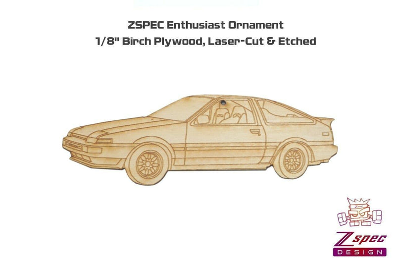 Cargue la imagen en el visor de la galería, Laser-etched wood ornament shaped like a Toyota Corolla AE86, made from light birch plywood.