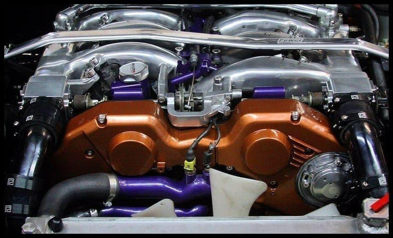Cargue la imagen en el visor de la galería, ZSPEC stainless and billet timing cover fastener kit installed on a Nissan 300ZX Z32 engine with copper covers.
