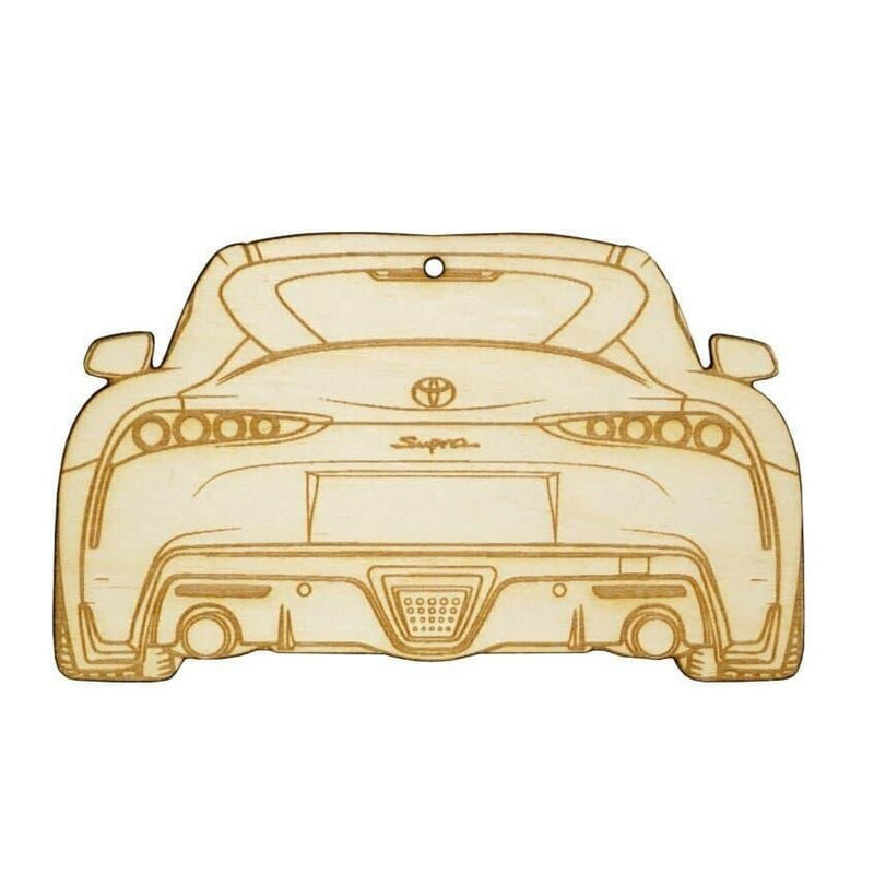 Load image into Gallery viewer, Laser-engraved birch wood ornament of a Toyota Supra MK5 rear profile.