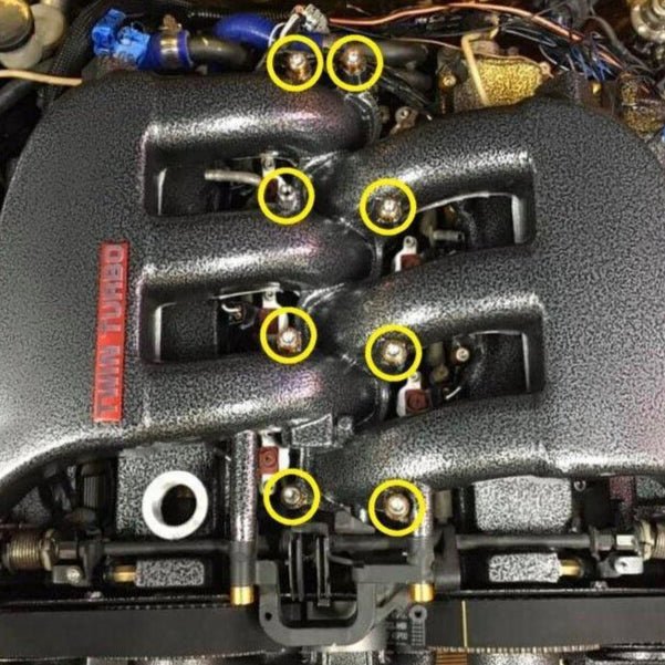 Load image into Gallery viewer, ZSPEC polished plenum fasteners installed on a textured black Nissan 300ZX Z32 Twin Turbo engine, highlighted in yellow.