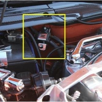 Load image into Gallery viewer, ZSPEC silver stainless steel battery cable bracket installed in a Nissan 300ZX Z32 engine bay.