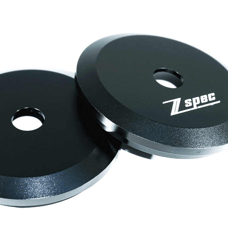 Load image into Gallery viewer, Black ZSPEC billet shock tower covers for 1990-1996 Nissan 300ZX Z32 with white logo on a white background.