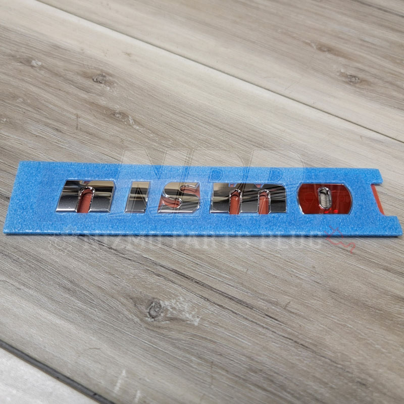 Load image into Gallery viewer, Nissan R35 GT-R Nismo Rear "NISMO" Emblem - NizmoPartsPlug