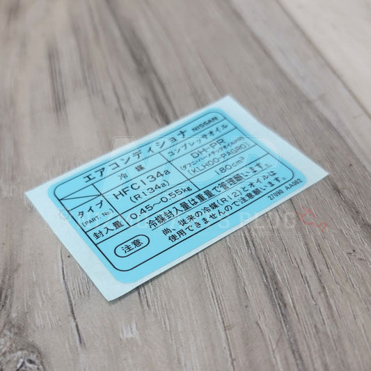 Etiqueta de especificaciones del aire acondicionado del Nissan R34 Skyline GTT