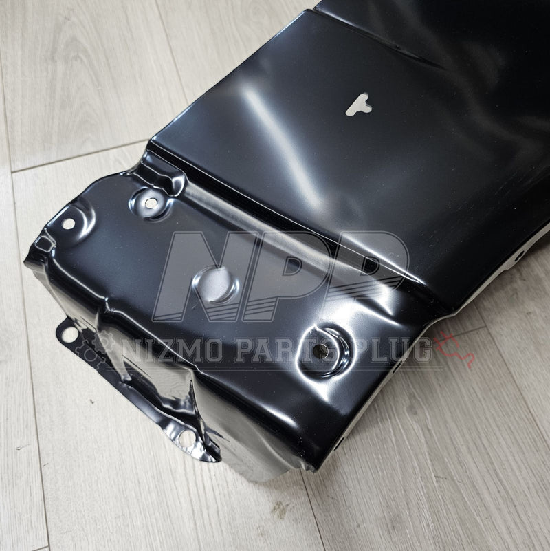 ギャラリービューアに画像をロードする, New black R34 Skyline GT-R RH front fender assembly, shown in pristine condition on a light wood floor.