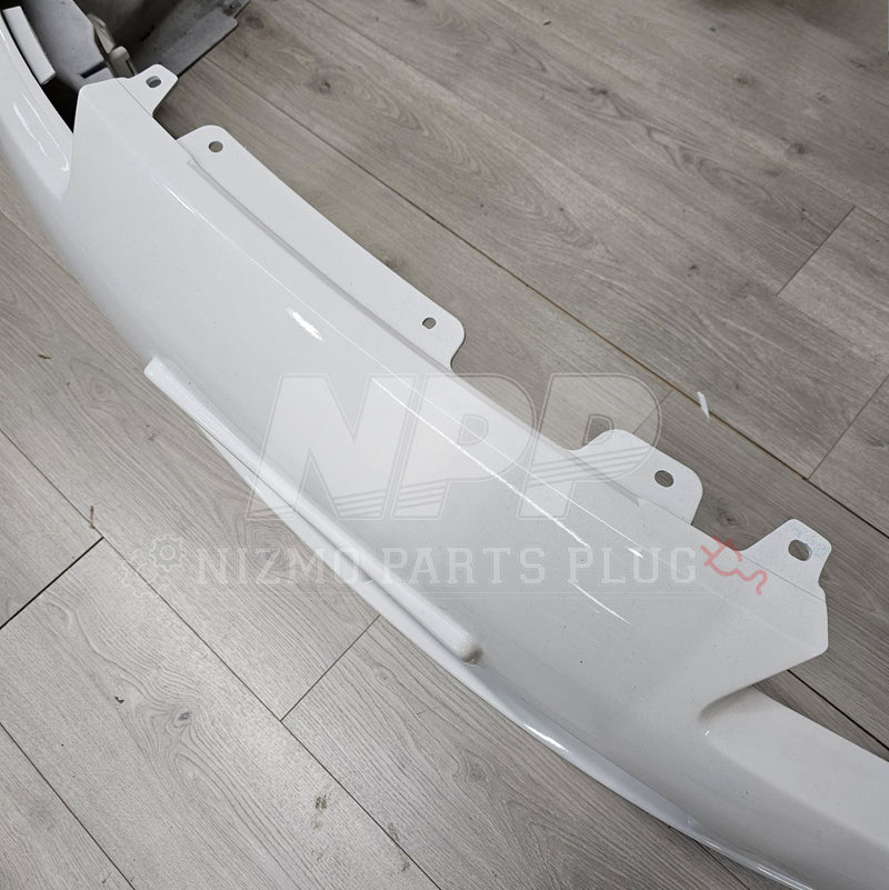 Load image into Gallery viewer, Pre-owned white OEM Spec-R Aero front bumper assembly for Nissan S15 Silvia on a wood-look floor.