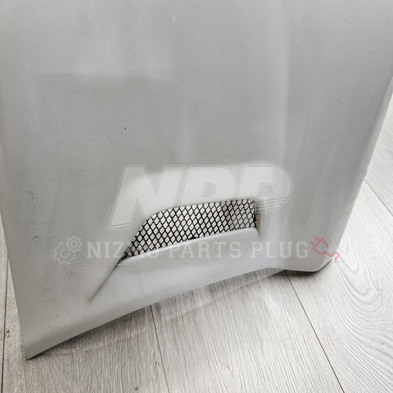 Load image into Gallery viewer, Pre-owned white Nissan S15 Spec-R Aero front bumper with black mesh intake vent.
