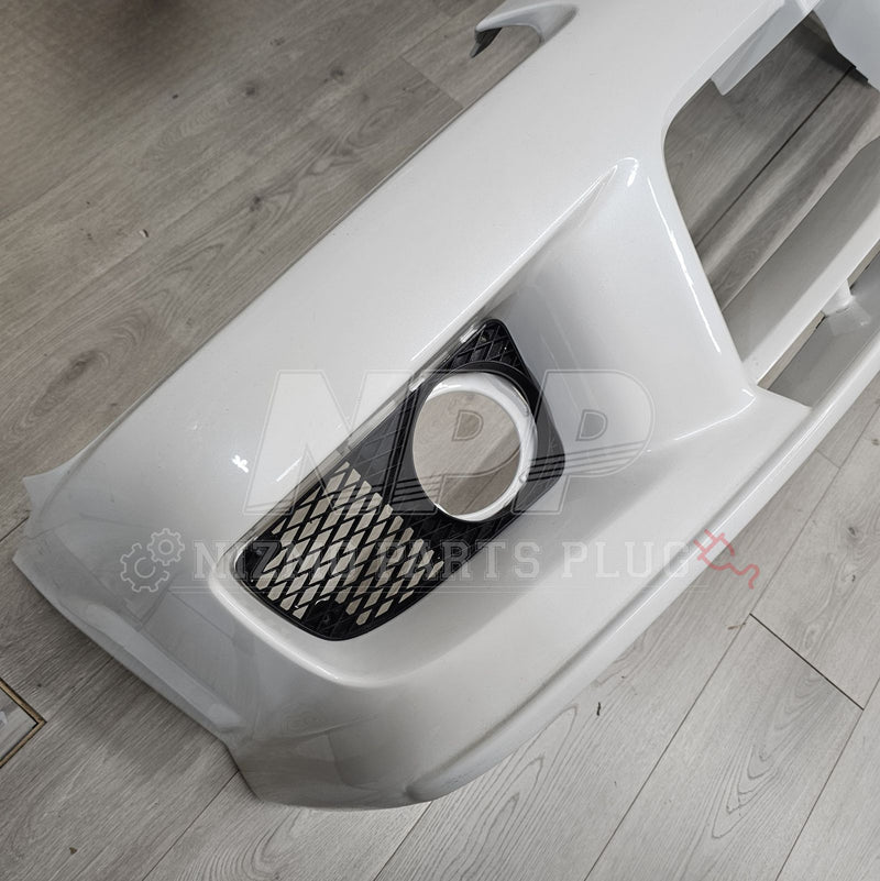Load image into Gallery viewer, Pre-owned white Nissan S15 Silvia Spec-R Aero front bumper with integrated fog light bezel and mesh grille.