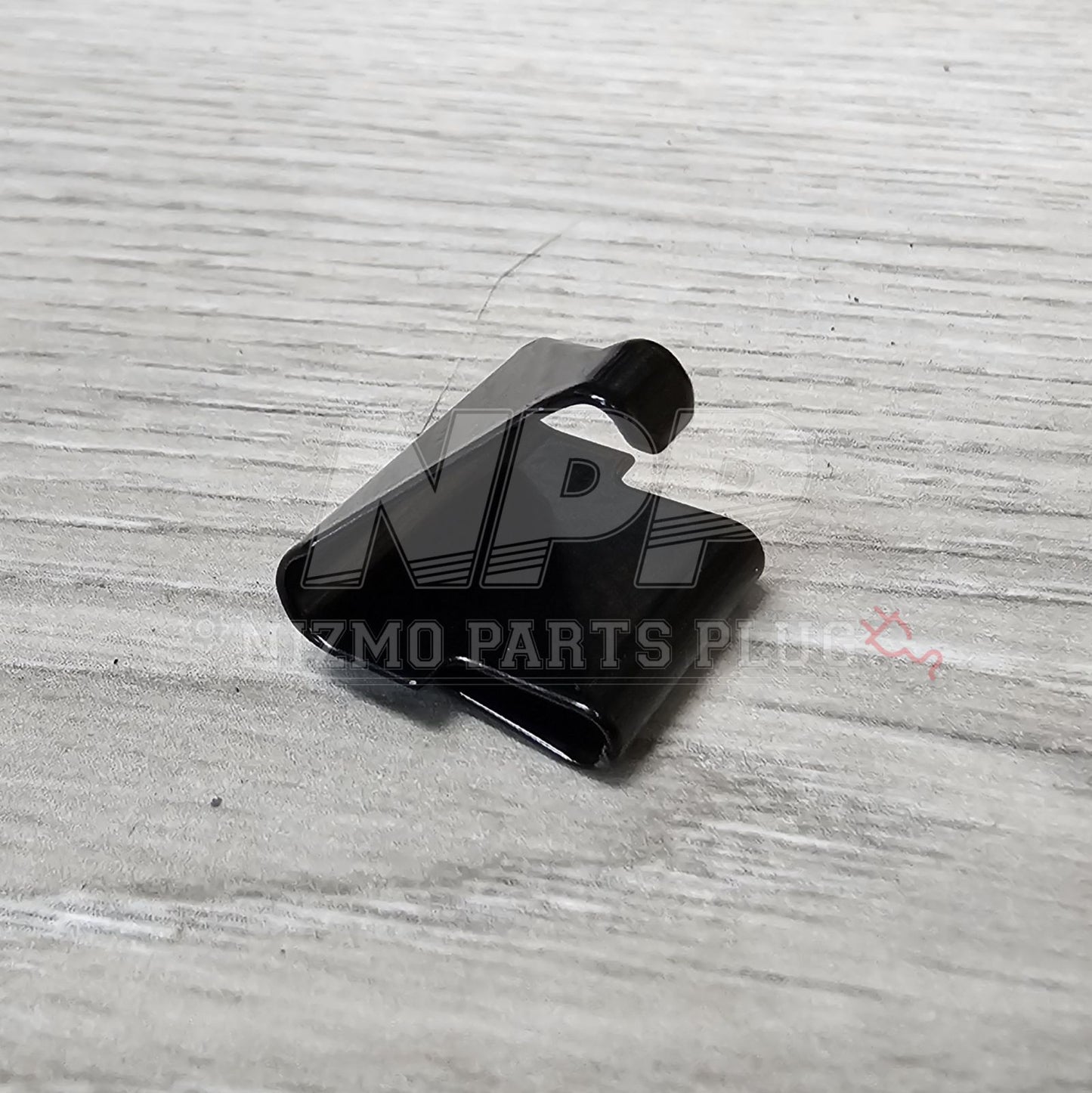 Nissan R34 Skyline Fuel Lid Return Release Spring - NizmoPartsPlug