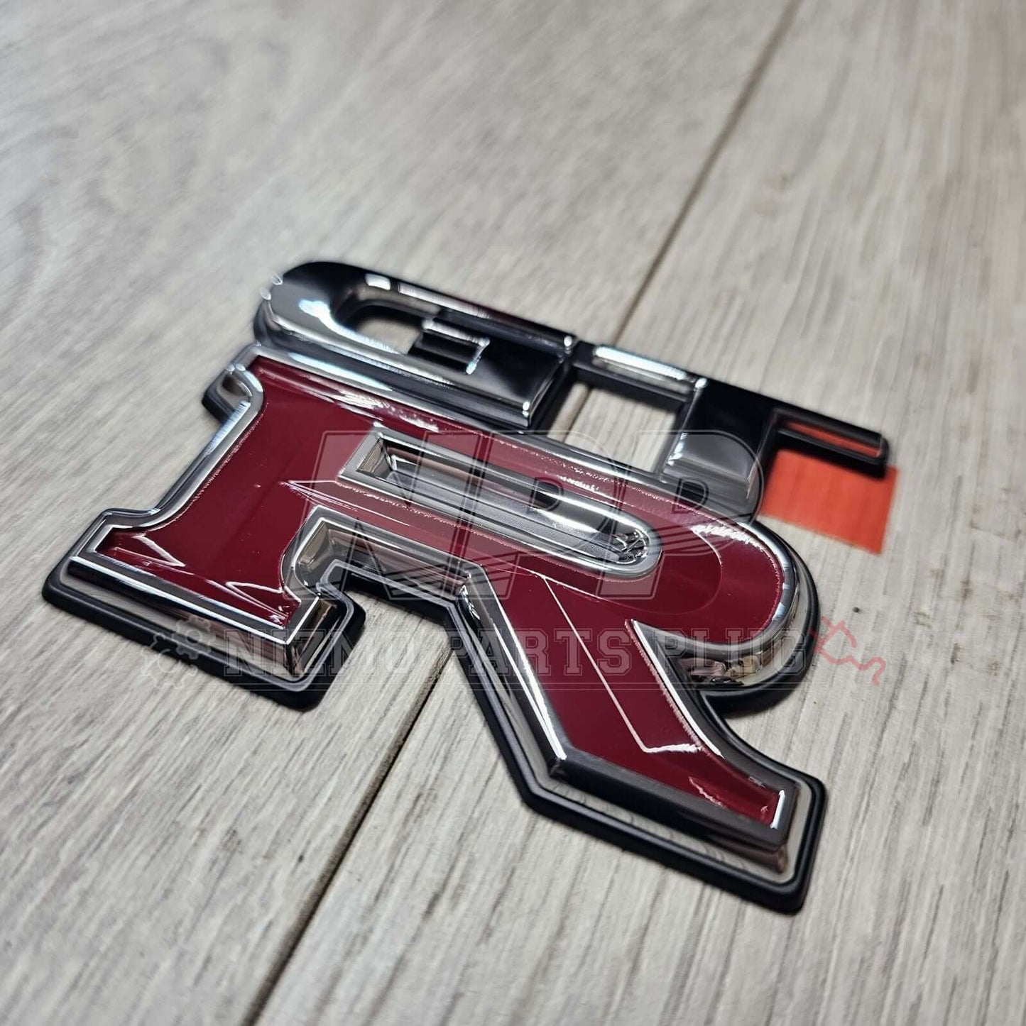 Nissan R33 Skyline GTR Rear Trunk Lid Emblem - NizmoPartsPlug