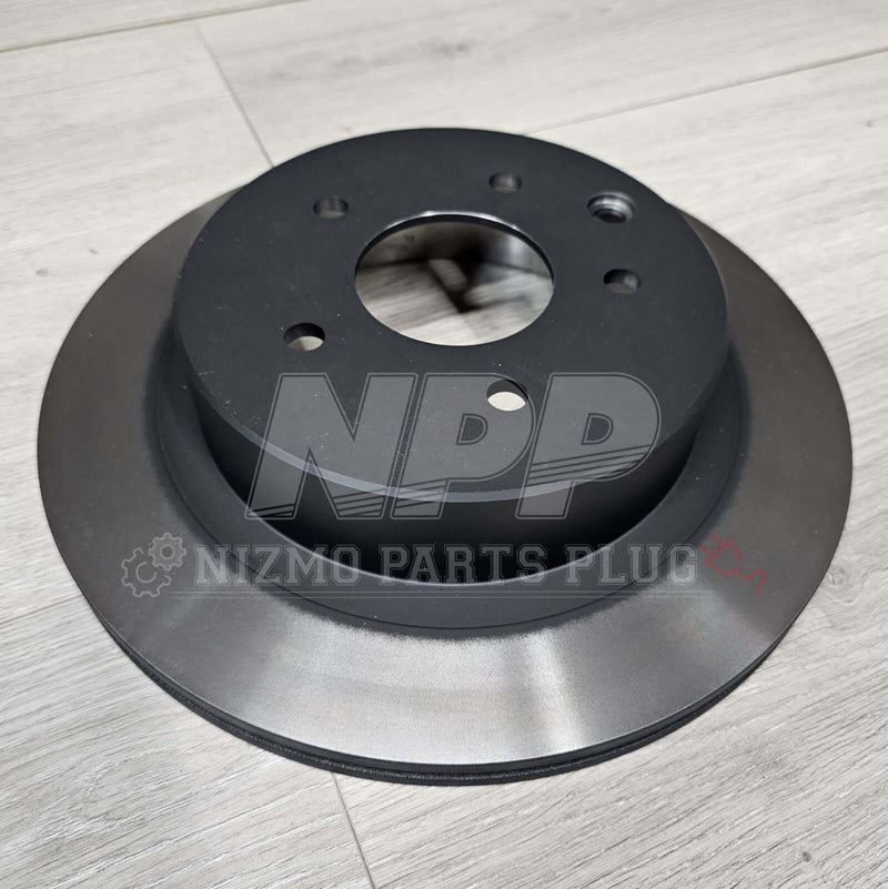 Load image into Gallery viewer, Nissan R34 Skyline GTT OEM Rear Brake Rotor Assembly - NizmoPartsPlug
