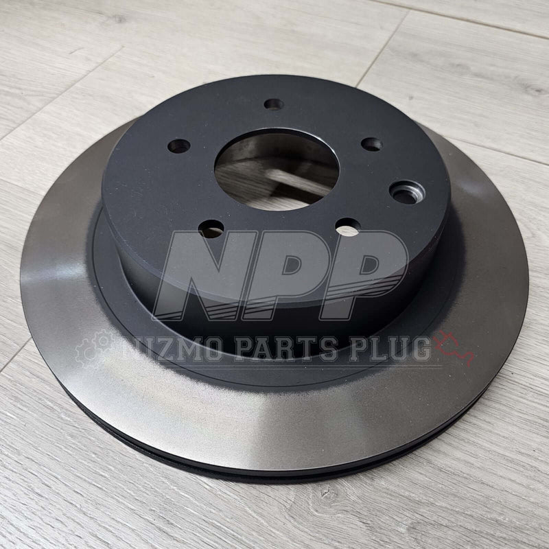 Load image into Gallery viewer, Nissan R34 Skyline GTT OEM Rear Brake Rotor Assembly - NizmoPartsPlug