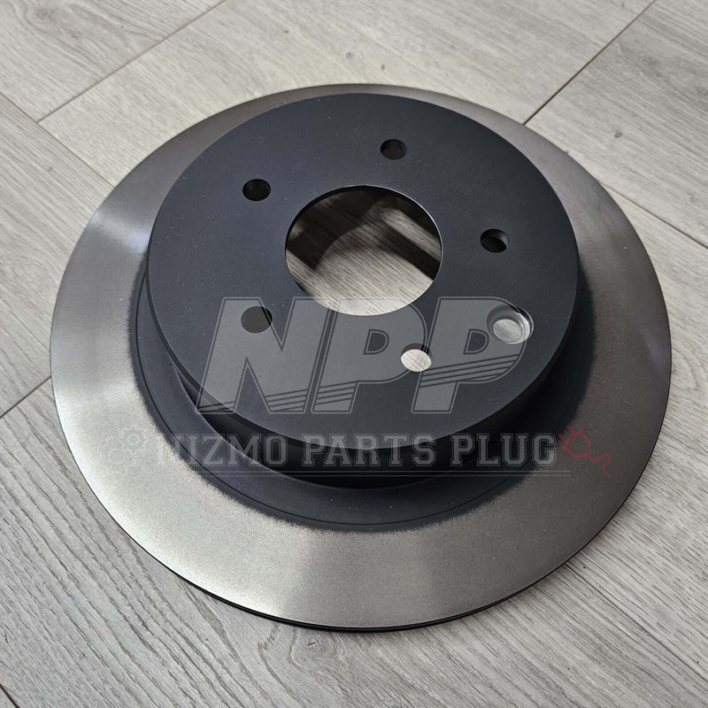 Load image into Gallery viewer, Nissan R34 Skyline GTT OEM Rear Brake Rotor Assembly - NizmoPartsPlug