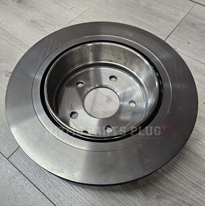 Load image into Gallery viewer, Nissan R34 Skyline GTT OEM Rear Brake Rotor Assembly - NizmoPartsPlug
