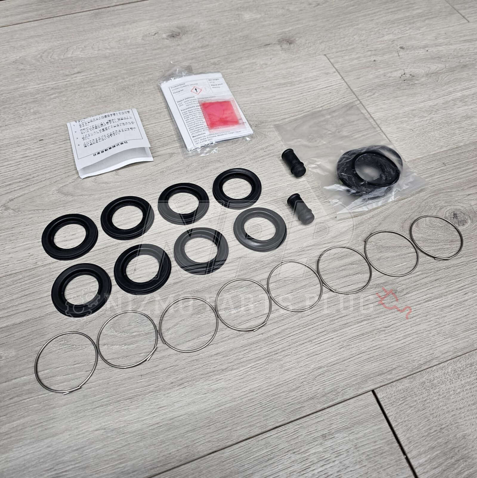 Nissan R34 Skyline GTT Rear Caliper Seal Rebuild Kit - NizmoPartsPlug