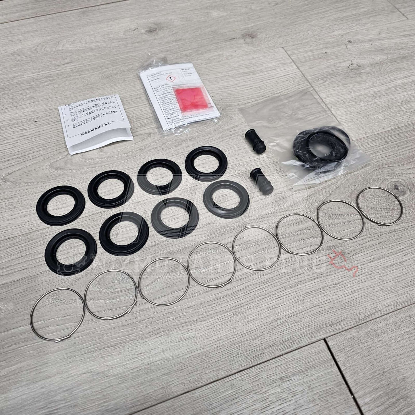 Nissan R34 Skyline GTT Rear Caliper Seal Rebuild Kit - NizmoPartsPlug