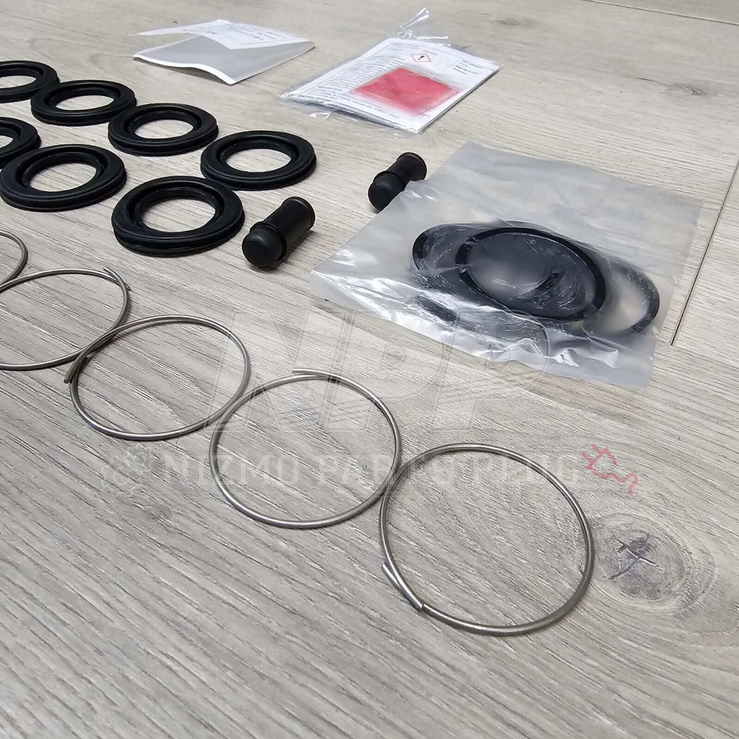 Nissan R34 Skyline GTT Rear Caliper Seal Rebuild Kit - NizmoPartsPlug
