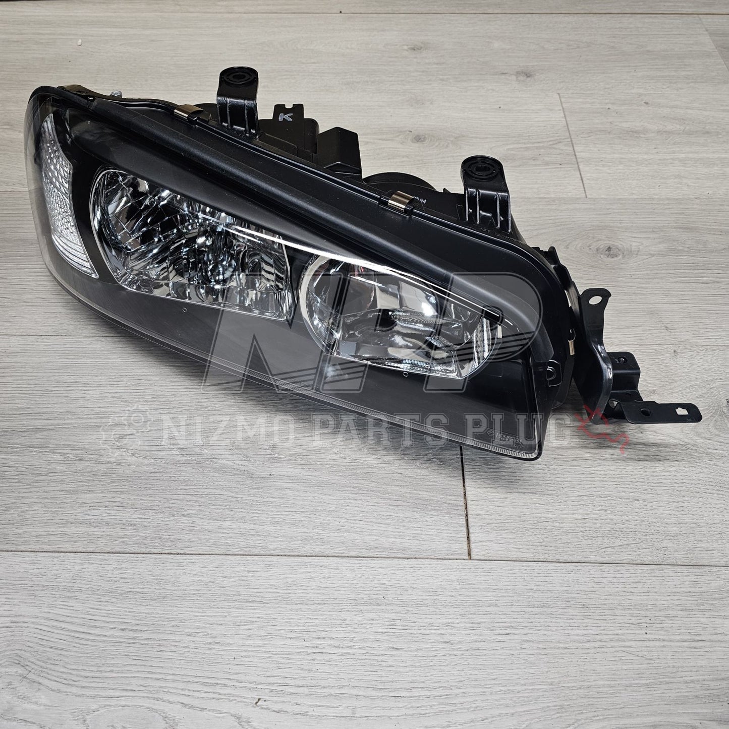Nissan R34 Skyline Headlight Assembly RH (Halogen) - NizmoPartsPlug